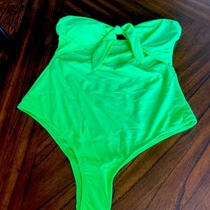 Neon Green bandeau front tie one piece swim suit.